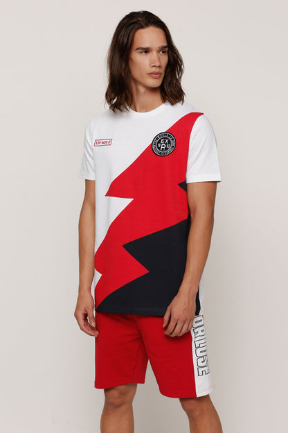 White graphic T-shirt with red and black diagonal artwork, short sleeves