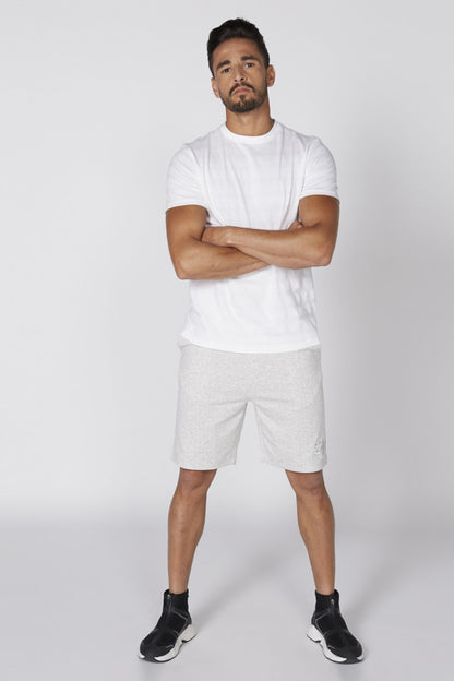 Splash grey shorts worn by a model, knee length with black drawstring