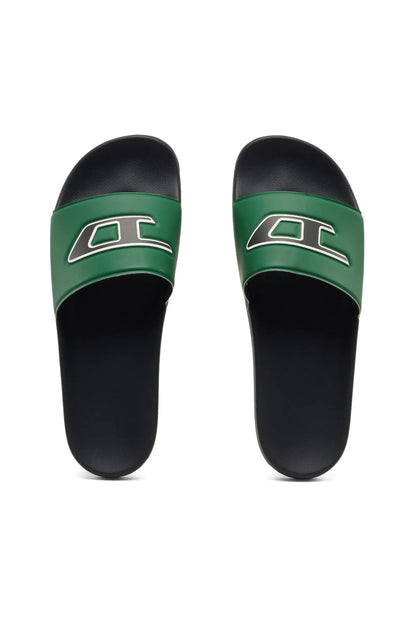 Green-and-black slide sandals, front view with white logo on each strap