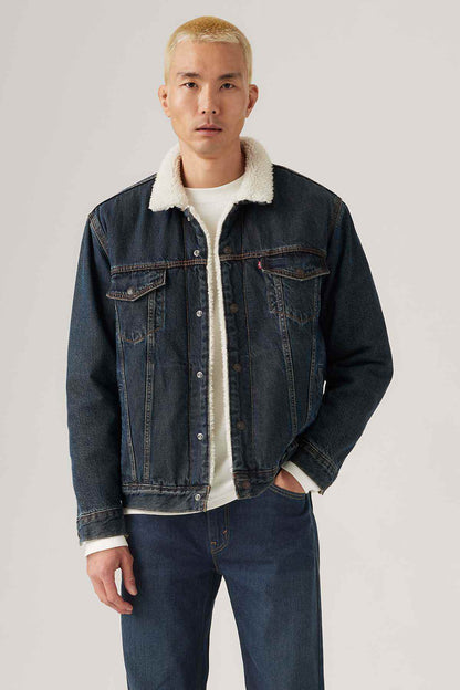 Levi's dark indigo denim jacket with sherpa-lined collar and chest pockets