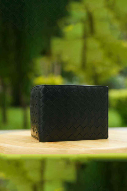 Black woven leather wallet front view with textured panel