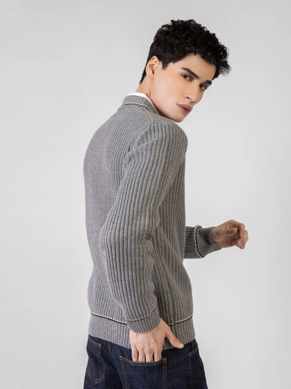 Grey ribbed V-neck knit sweater, side view with textured knit