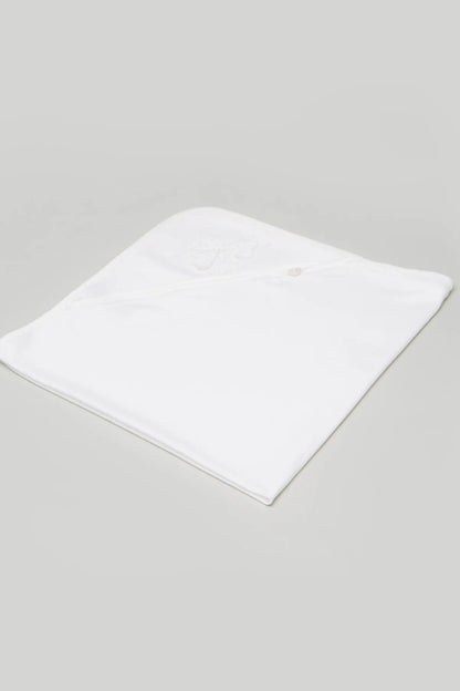 White baby blanket, folded with subtle stitched applique corner