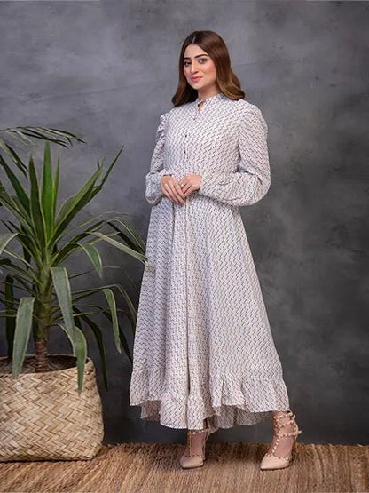 White printed long-sleeve maxi dress with buttoned collar and gathered skirt
