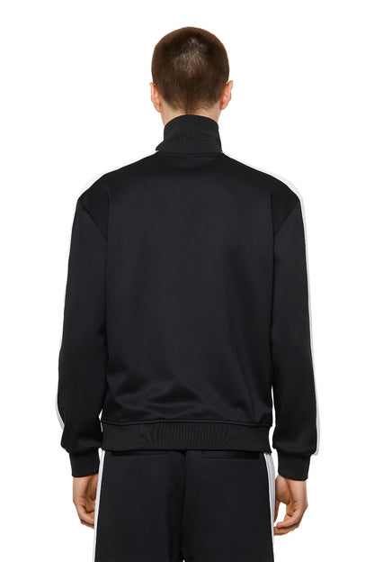 Black zip track jacket back view with stand collar and elastic cuffs