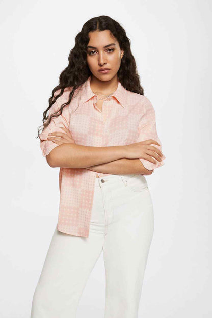 Light pink patterned button-up shirt with button front and long sleeves