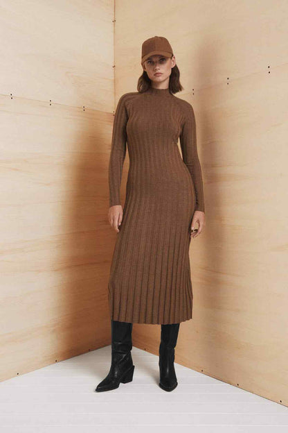 Caramel ribbed knit midi dress with long sleeves, cap and black boots