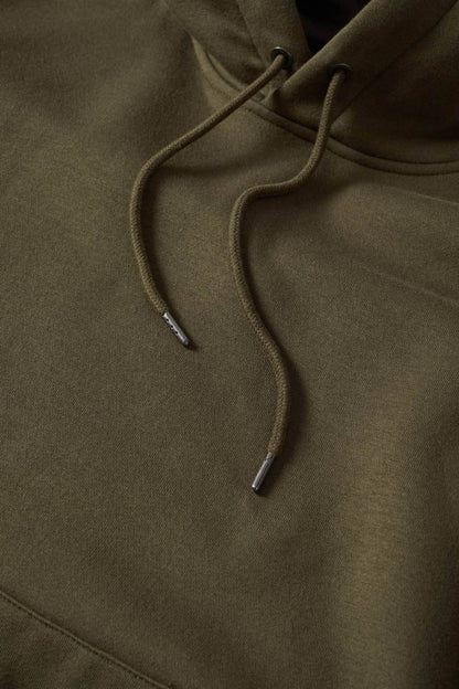 Khaki hoodie fabric and drawstring cord close-up with eyelet ends