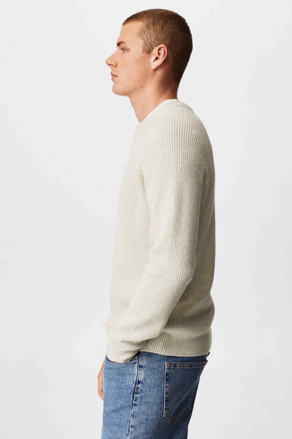 Ecru ribbed knit crewneck sweater with long sleeves, side view on model
