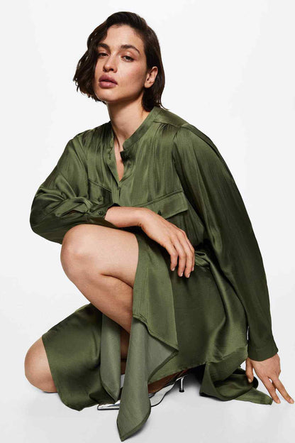 Olive-green shirt dress with V-neck placket, chest pockets, and tied waist belt