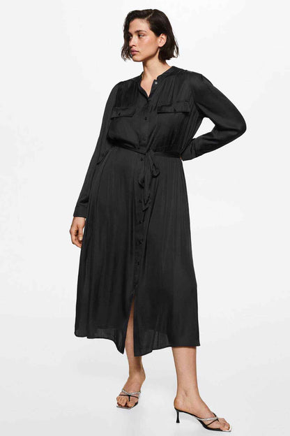 Black midi shirt dress with button front, chest flap pockets, tied waist, long sleeves