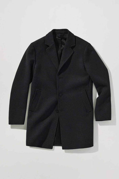 MANGO dark overcoat front view with notch lapels and button fastening