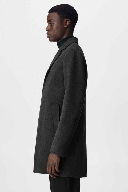 MANGO dark heather grey overcoat side view with long sleeves and front pocket