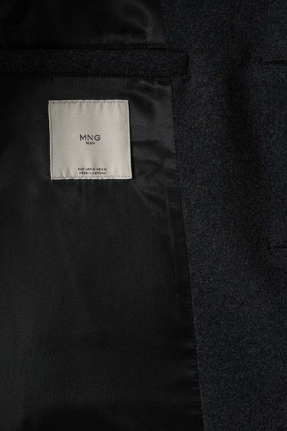 MANGO overcoat interior fabric label on dark heather grey lining