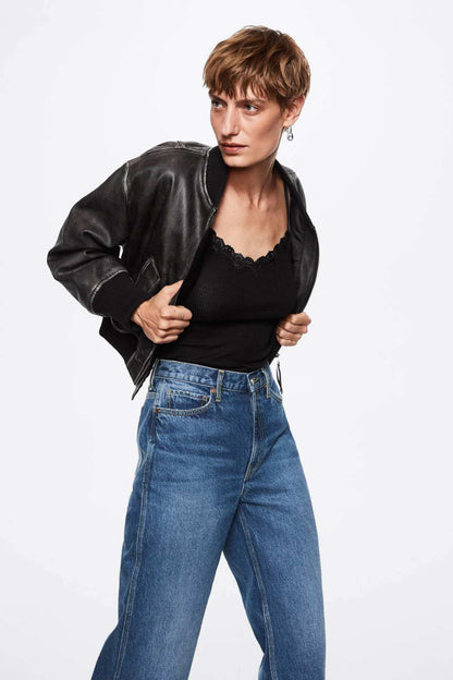 MANGO dark blue denim jeans with wide leg and front button fly, on-model