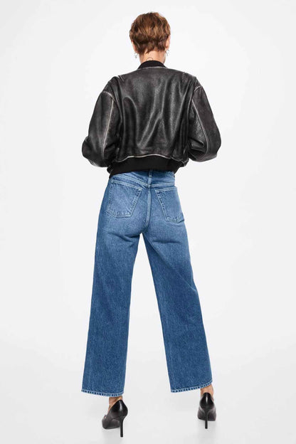 MANGO dark blue denim jeans shown from the back, wide-leg fit, belt loops