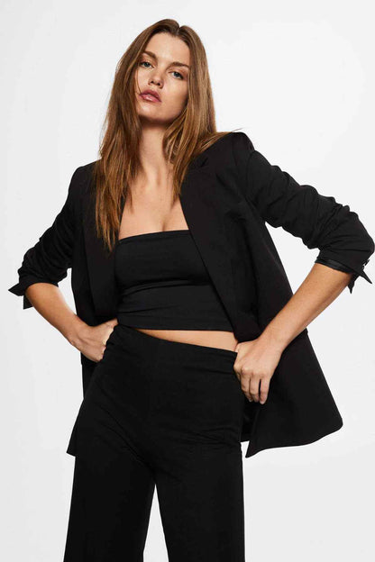 Black high-waist wide-leg trousers with smooth front