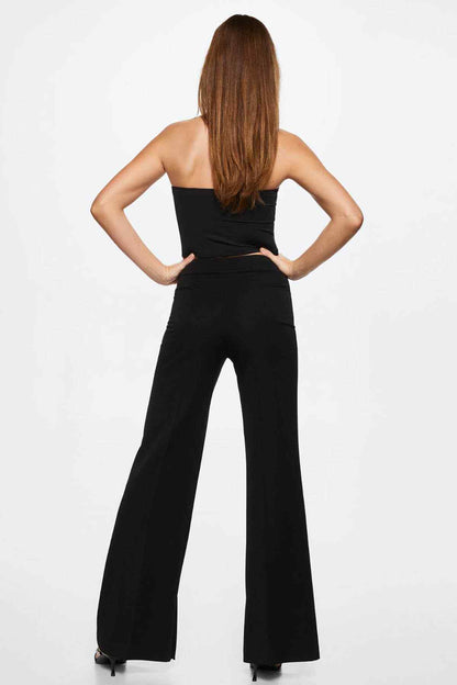 Black high-waist wide-leg trousers, back view