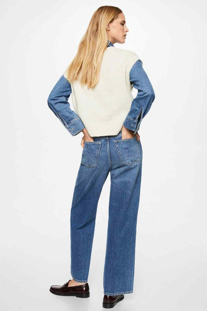 Ecru sweater back with blue denim-look sleeves and charcoal argyle diamond pattern