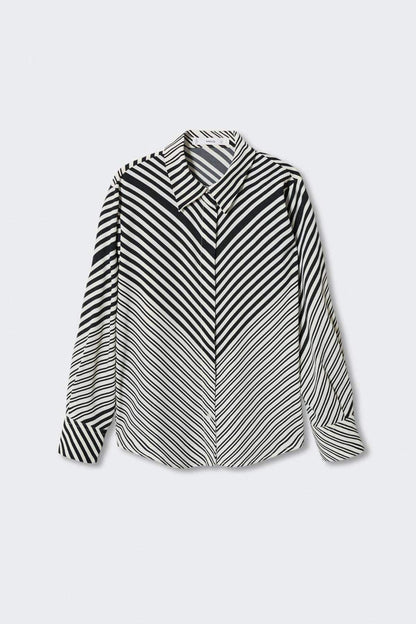 Black-and-white striped button-front blouse with pointed collar and long sleeves