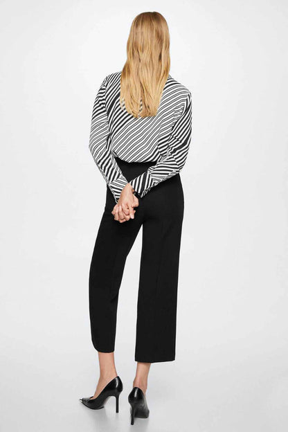 Black-and-white striped blouse with pointed collar and long sleeves (back view)