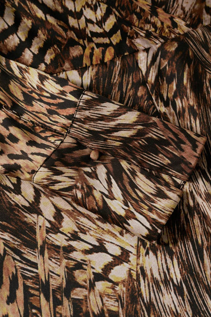 Animal-print fabric close-up in brown, black, and beige for a midi dress