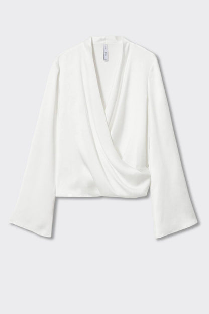 Off-white wrap-style blouse with V-neck and long sleeves
