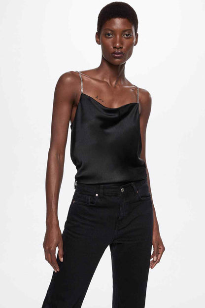 Black satin camisole top with thin chain-strap detail and cowl neckline