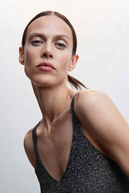 Black glitter V-neck tank top neckline and wide straps