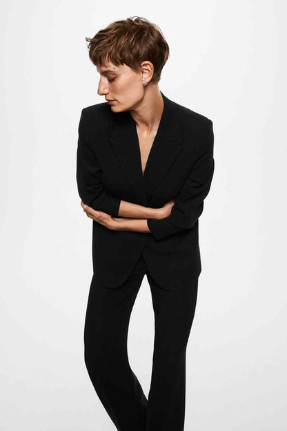 Black tailored blazer with notch lapels, single-breasted front, flap pockets, 3/4 sleeves