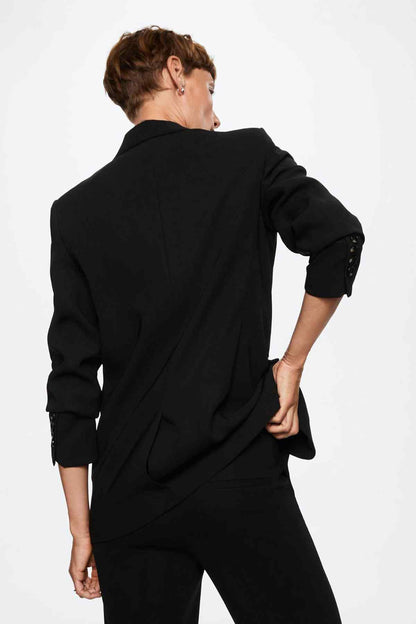 Black blazer back view with notched collar, single-breasted seams, 3/4 sleeves