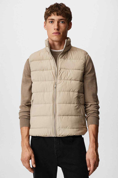 Ice grey puffer vest with full front zipper and stand collar