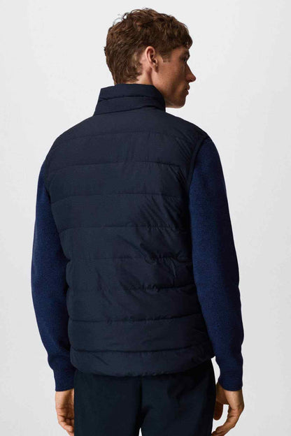 MANGO navy quilted puffer vest from back view, horizontal baffles, full-zip