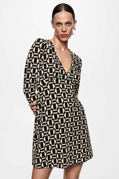 Black and cream geometric print mini dress with V-neck and long sleeves