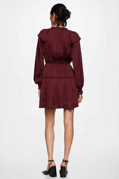 Wine red mini dress from back view with ruffled shoulders and elastic waist