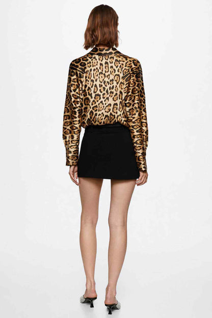 Leopard-print blouse back view with long sleeves and gathered cuffs