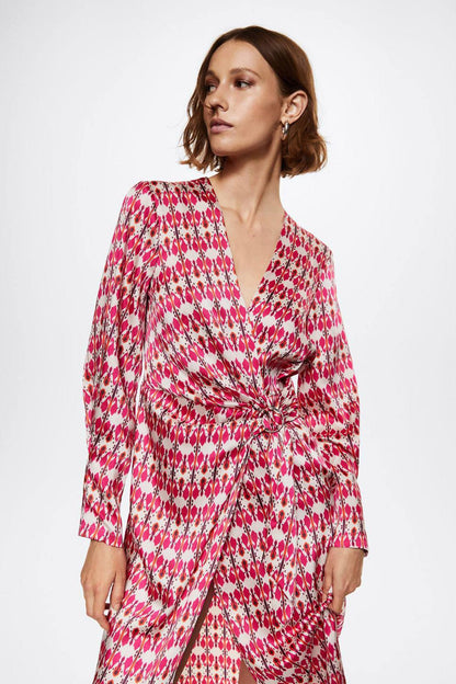 Fuchsia printed wrap midi dress with V-neck, long sleeves, and tied waist belt