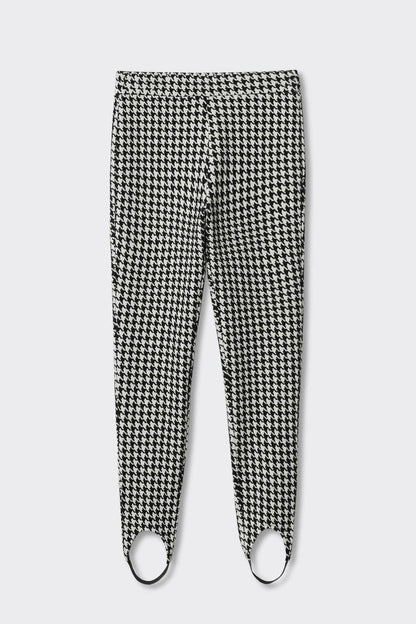 Houndstooth trousers flat lay, black-and-white with ankle hems