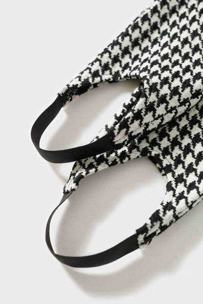Houndstooth trousers waistband with belt loops and black trim
