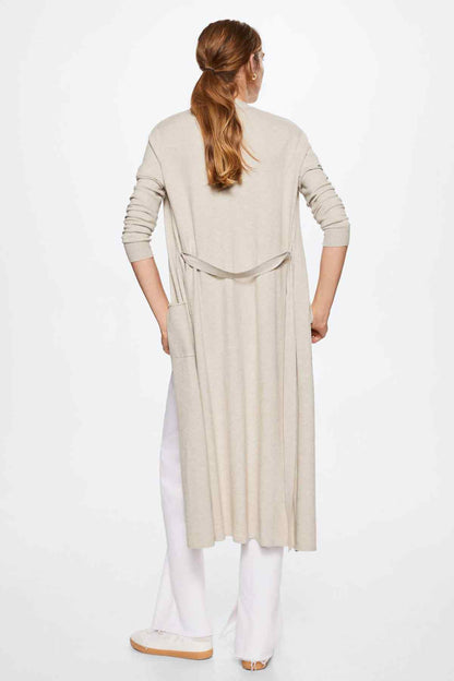Back view of light pastel grey long cardigan with draped silhouette and tie belt