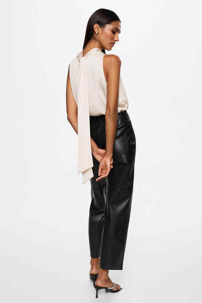 Ecru sleeveless blouse back view with open back and neck tie