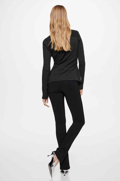 Black pinstripe blazer, back view with long sleeves and fitted waist