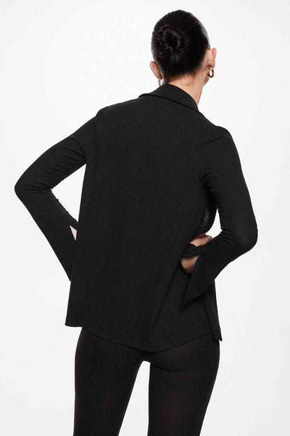 Black knit button-up jacket, back view with yoke seam and long sleeves