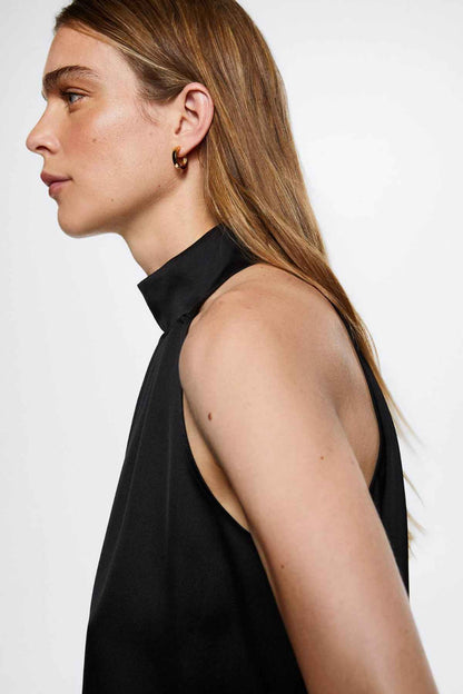 Black sleeveless high-neck blouse, back/side view with open shoulder area