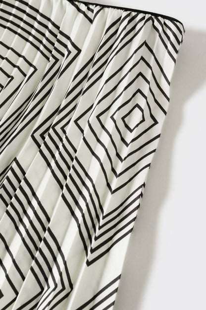 Geometric line-print fabric for pleated midi skirt in black and white