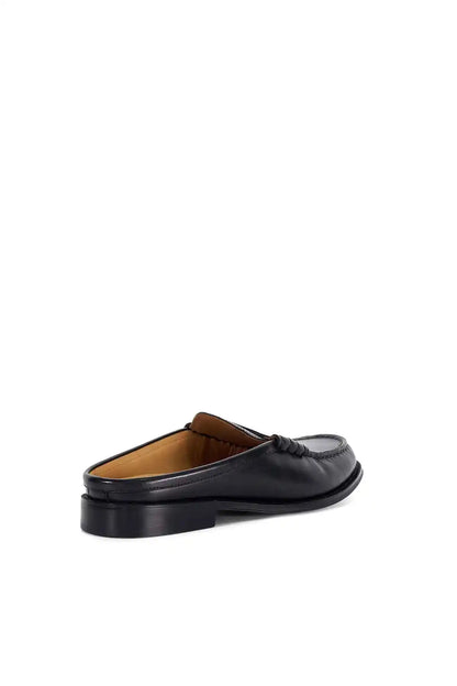 Black mule loafer with tan lining and slip-on vamp