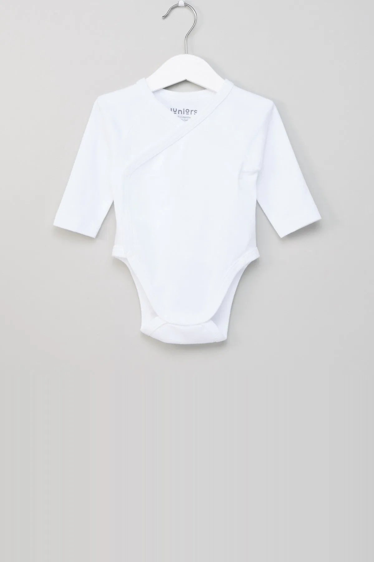 White baby bodysuit with long sleeves and crew neckline
