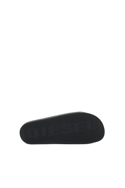 Diesel black slide sandal outsole with embossed DIESEL branding