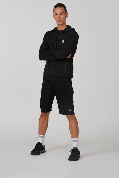Black drawstring shorts, knee-length cargo style with side pocket and leg logo