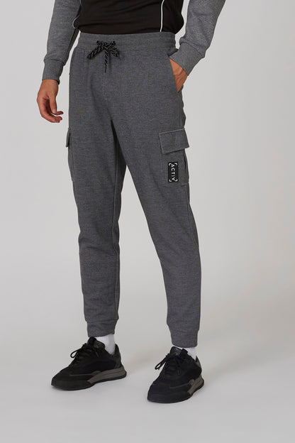 Grey drawstring jogger pants with cargo side pockets and tapered cuffs